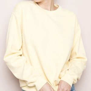 Brandy Melville light yellow sweatshirt